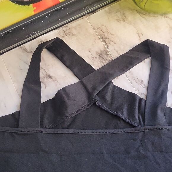 Sleek Black Asymmetrical Sleeveless Bodysuit - Picture 9 of 12